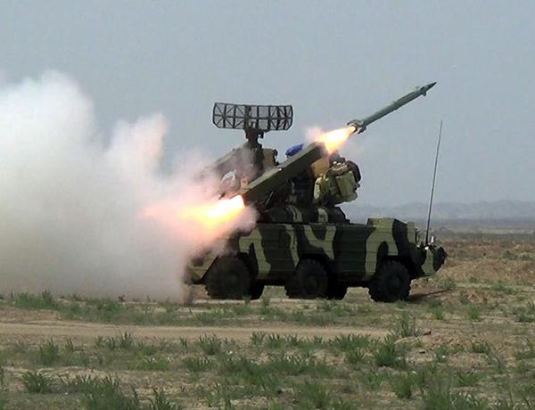 Anti-aircraft missile units conduct live-fire tactical exercises